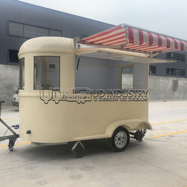 LIGHT YELLOW HORSE FOOD TRAILER