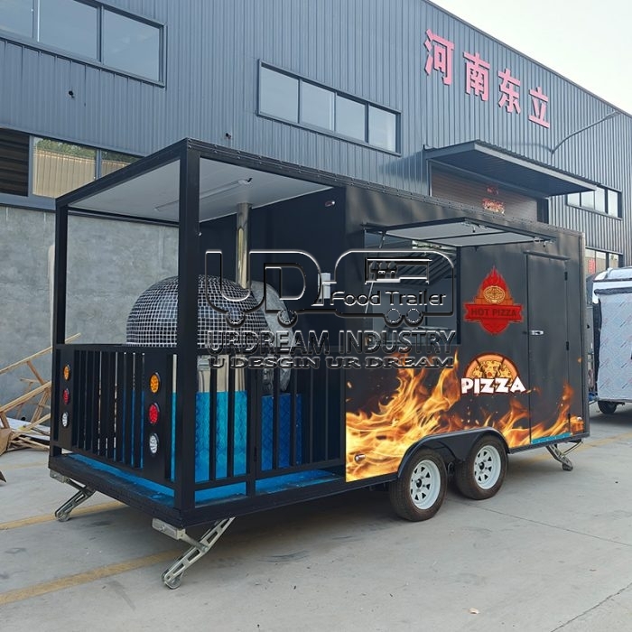 16.5ft black pizza square food trailer with fence and car stickers