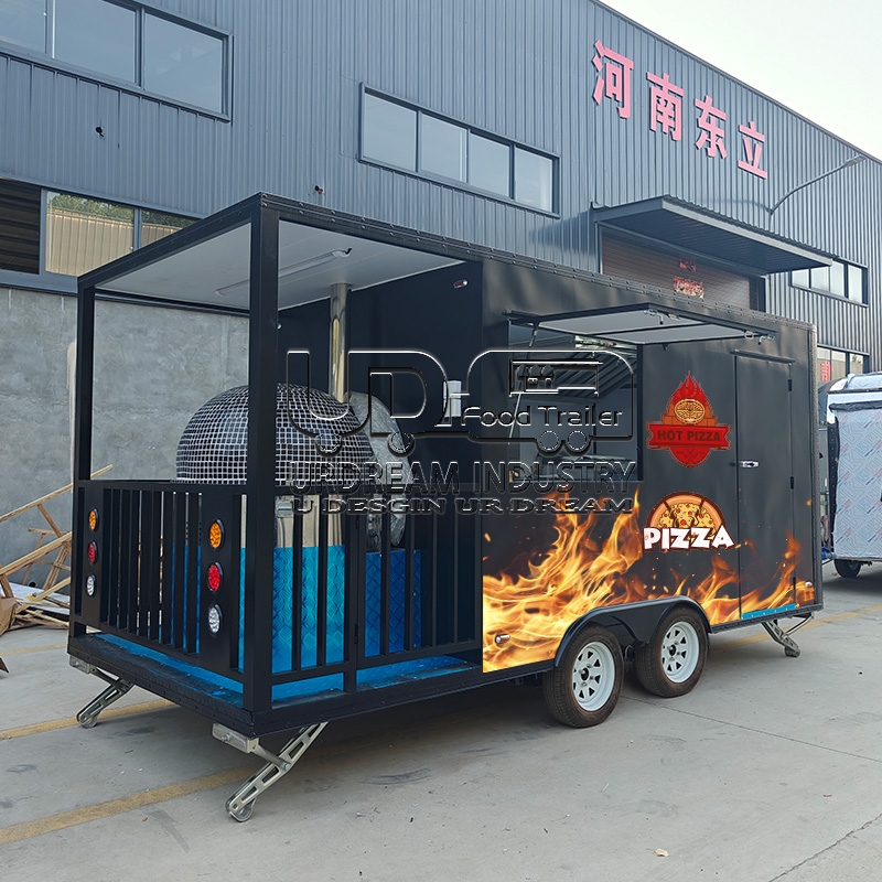 16.5ft black pizza square food trailer with fence and car stickers