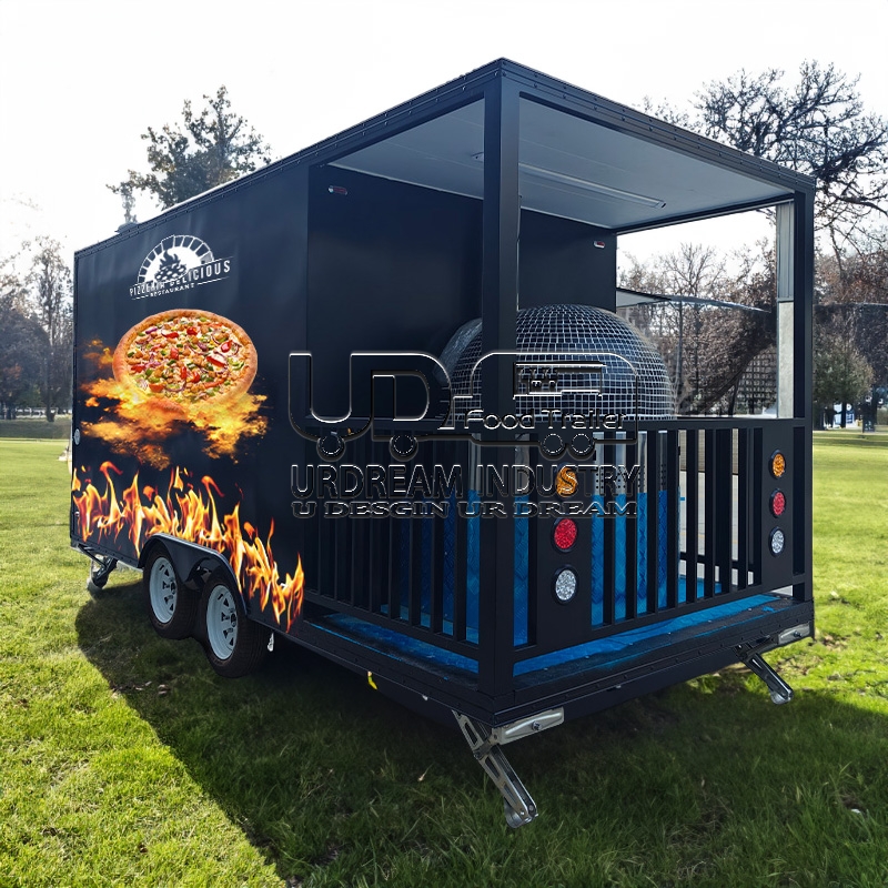 16.5ft black pizza square food trailer with fence and car stickers